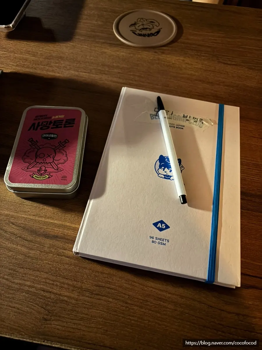 Guestbook and game props on a table