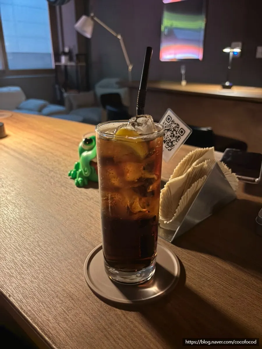 Jack and Coke placed on the bar table