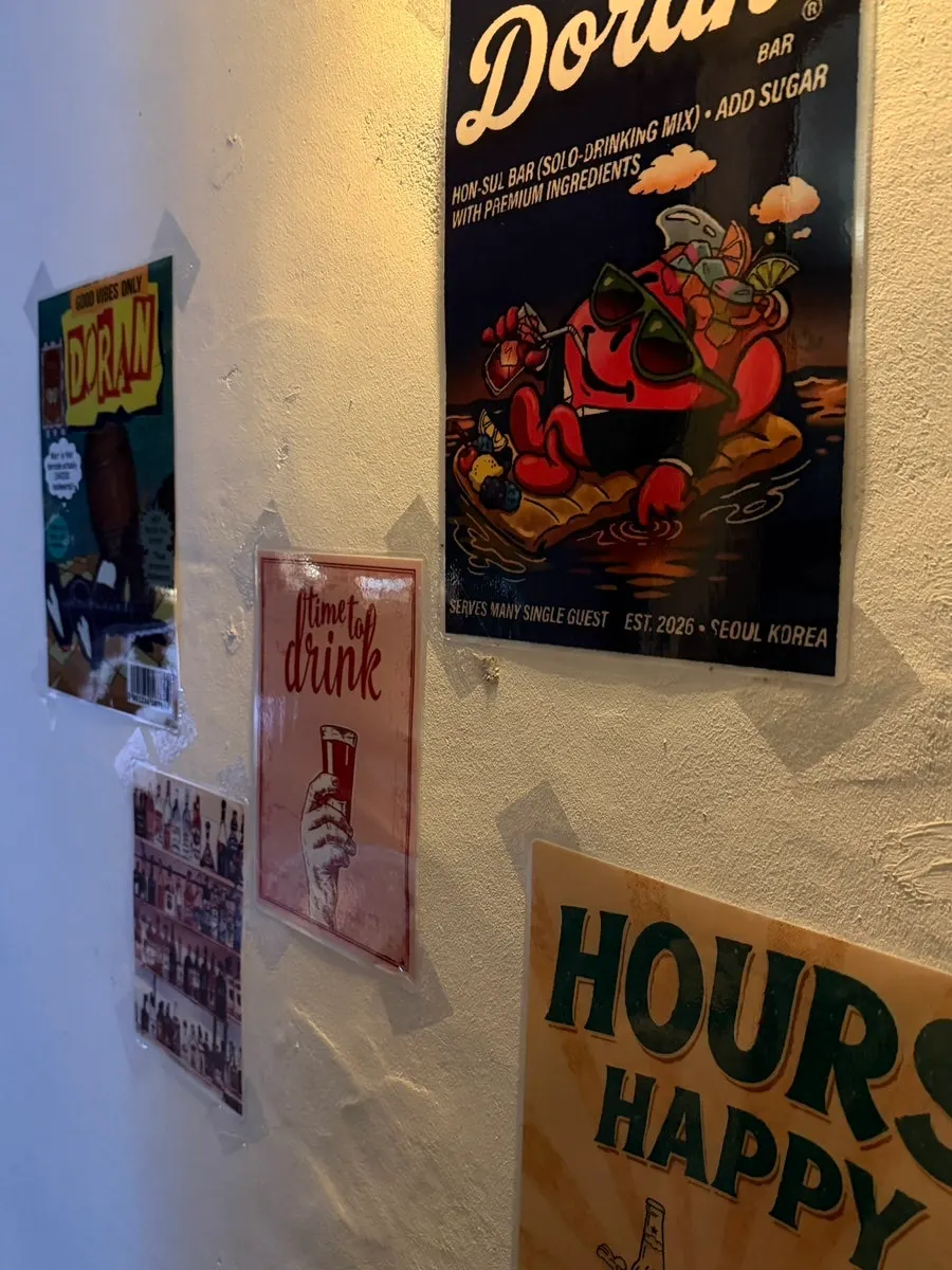 Poster on the wall at the entrance of Doran Honsul Bar Hongdae Branch