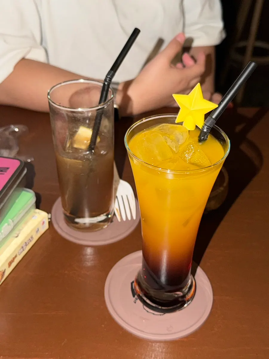 Toasting glasses with a stranger at the bar