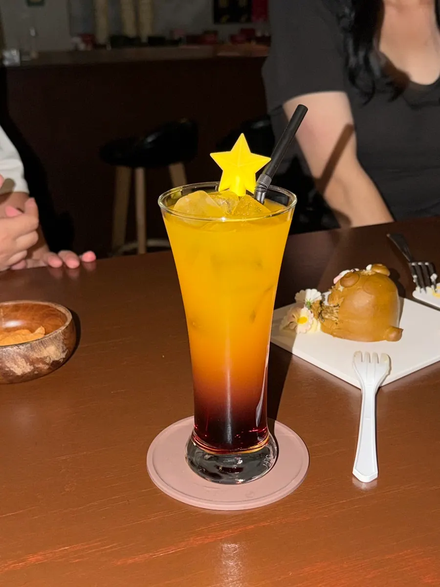 A glass of the Cassis Orange cocktail