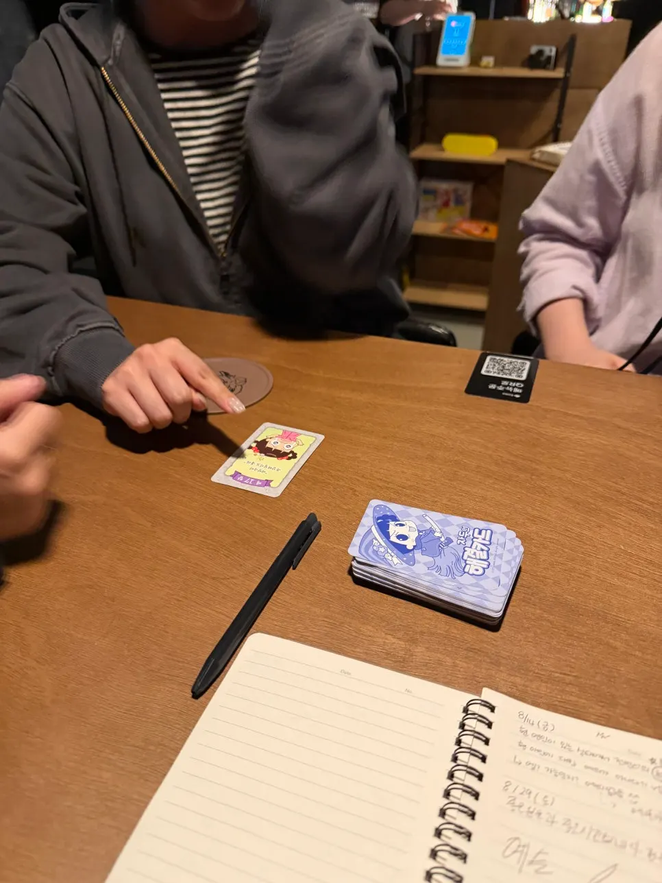 Game pieces set out on a solo bar table