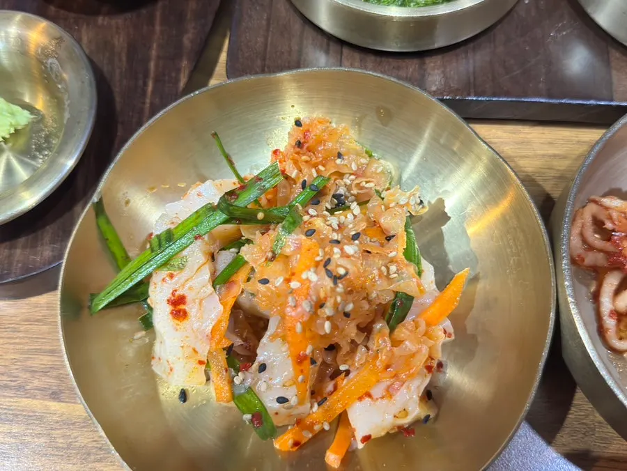 Primer plano de los banchan cuidados de Dorimgwan