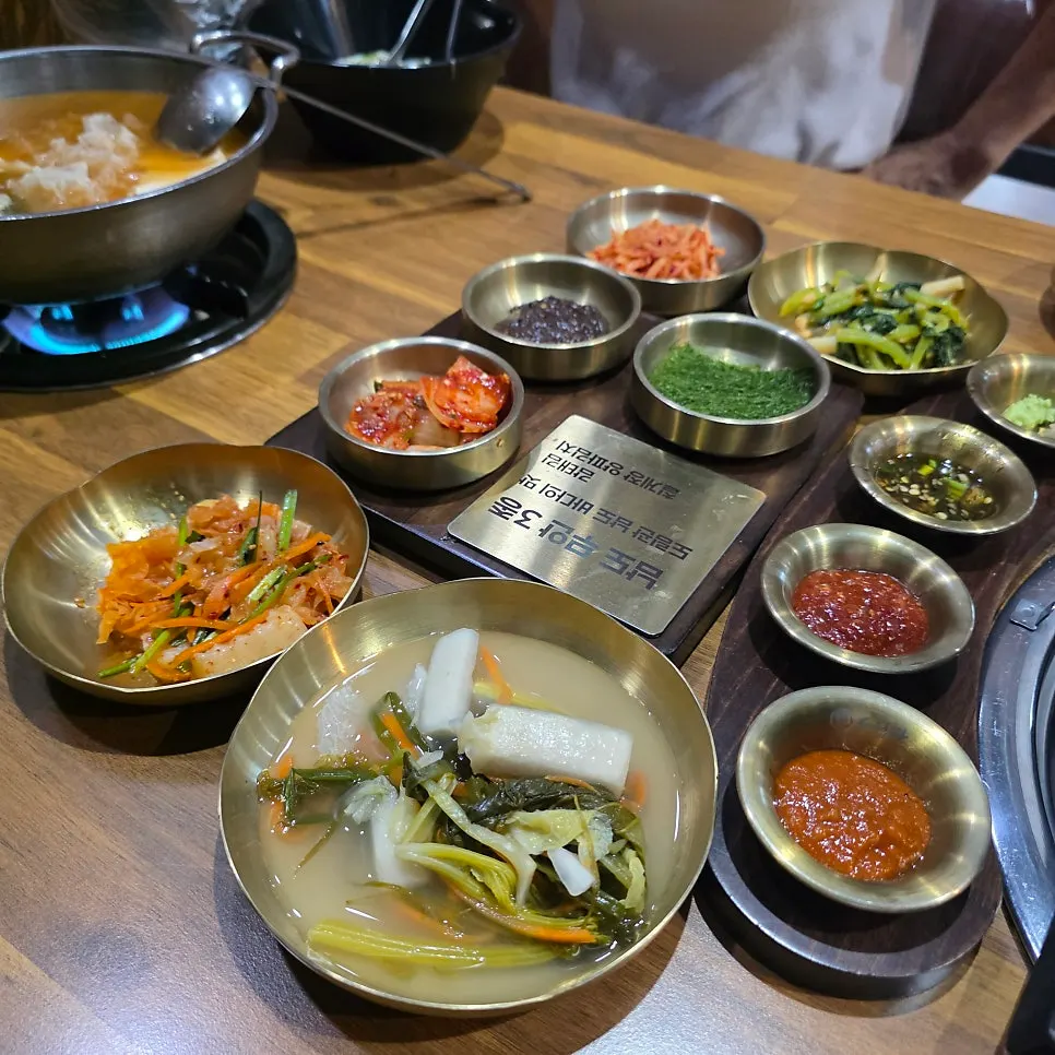 Gamtae seaweed, chilgejang, and onion kimchi banchan spread