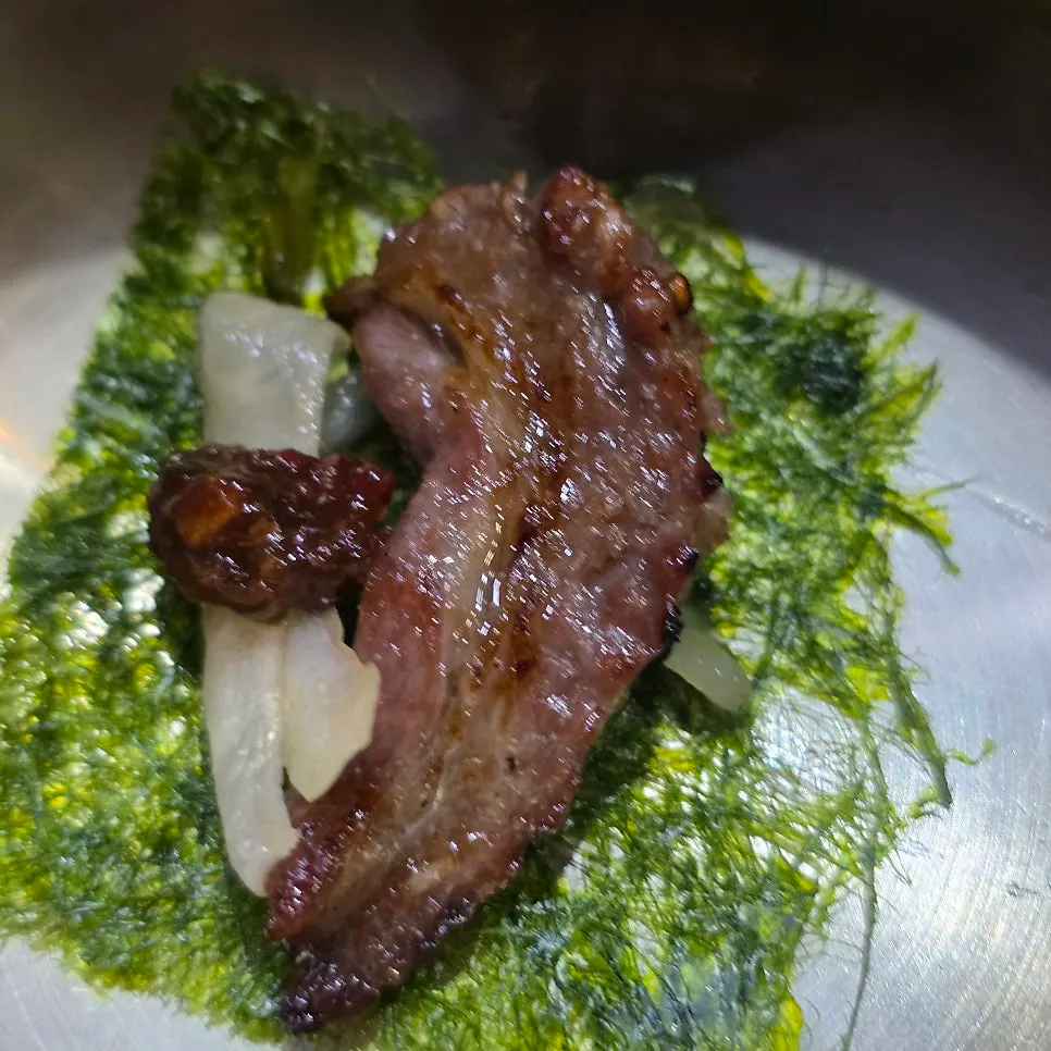 Close-up of fully grilled marinated short rib meat