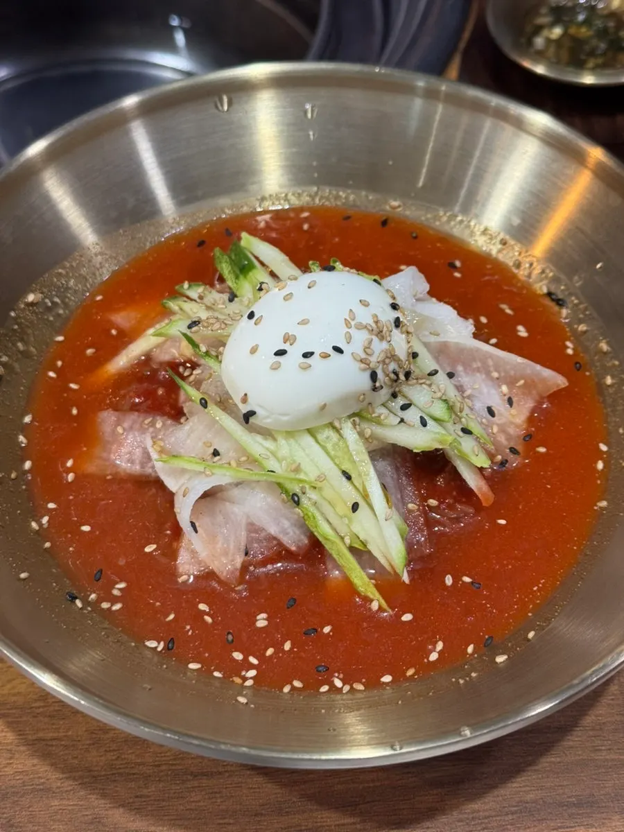 A bowl of bibim naengmyeon ordered for dessert