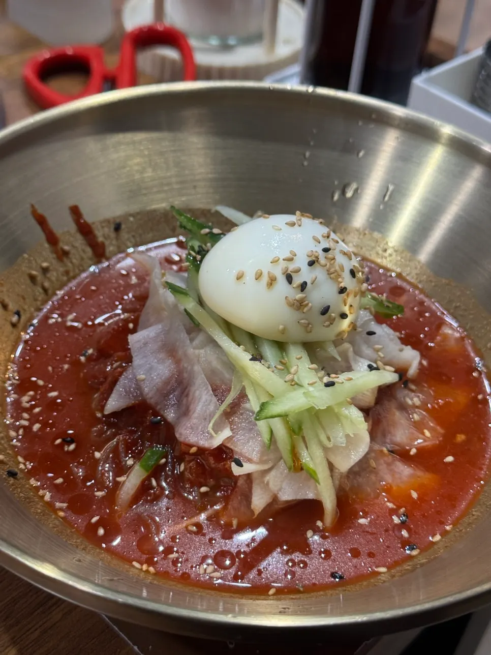 Short rib wrapped in gamtae gim and dipped in chilgejang