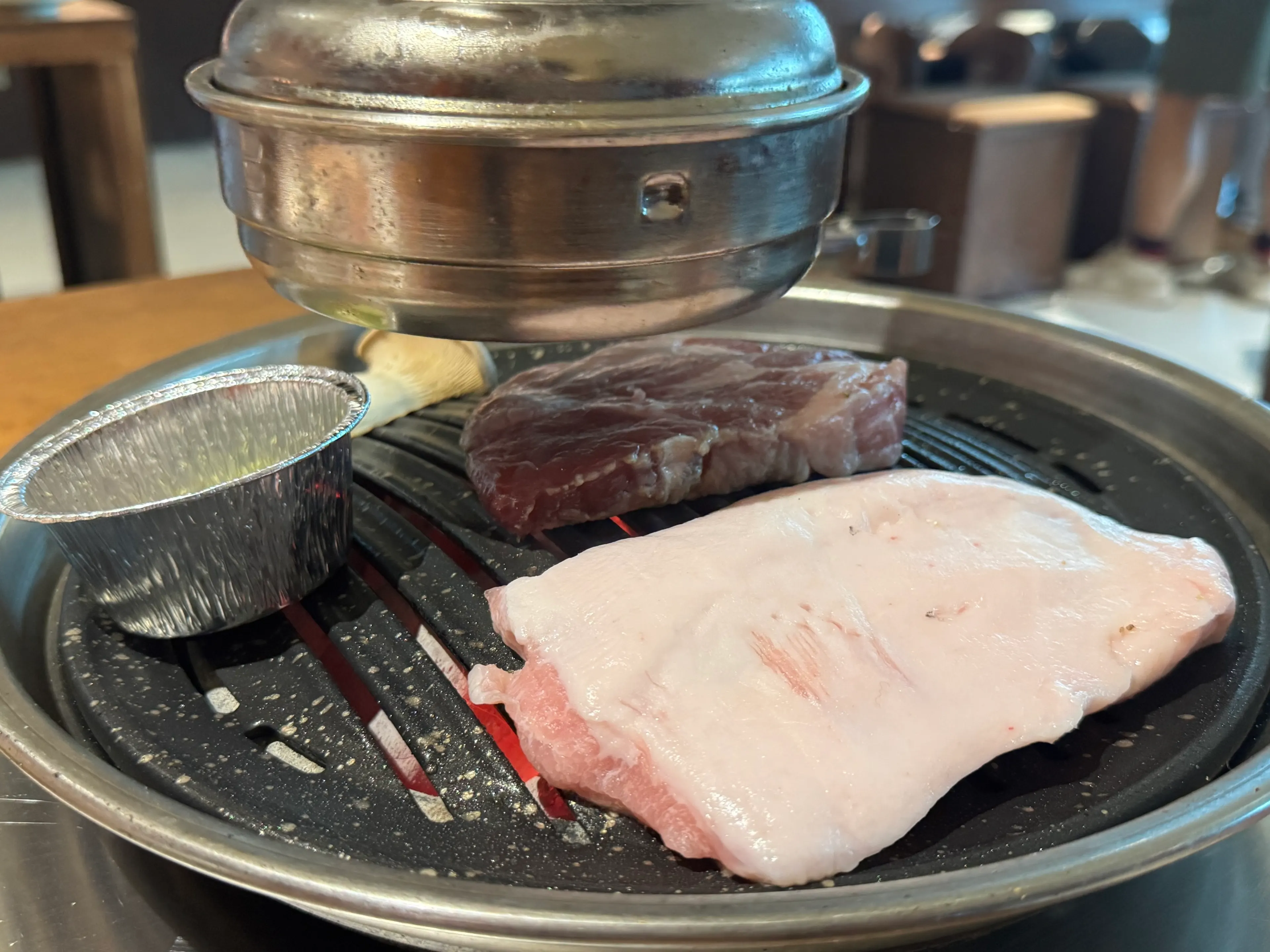 The open kitchen and seating at Dot Osong