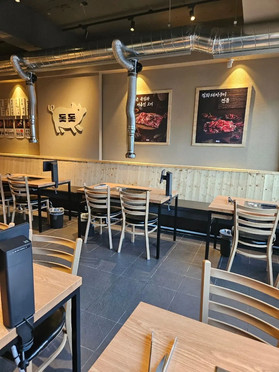 Cozy interior and tables at Dotdot Milyang Main Branch