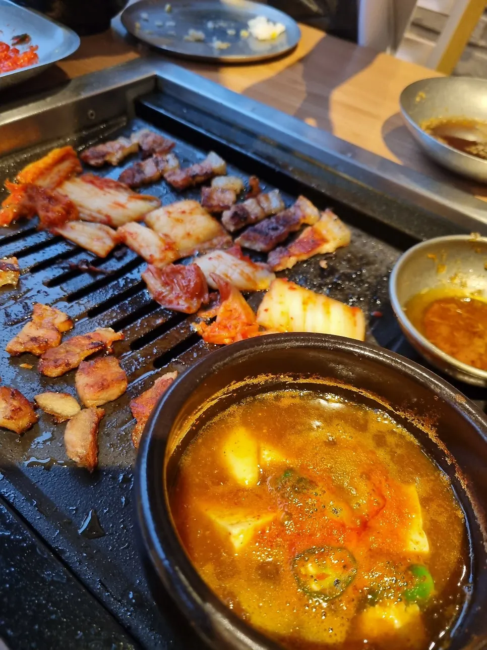 Jeju-style myeoljorim simmered anchovy dish on the grill