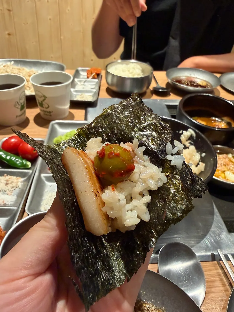 Hangjeongsal grilling on the pan at Dotdot