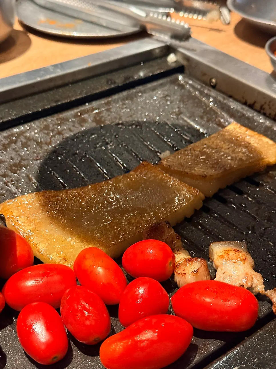 Fresh pork belly grilling on the plate