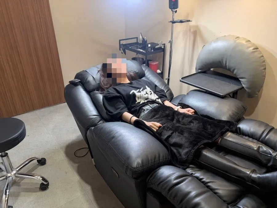 Hairline scalp tattoo procedure in progress
