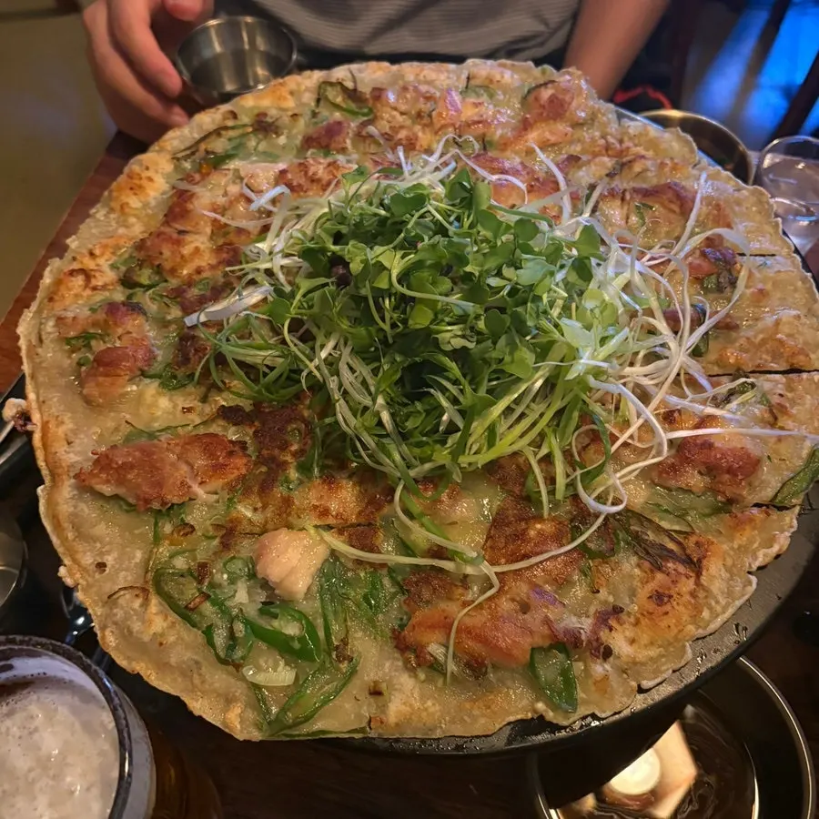 Dishes laid out on the table at Sinseon Sulzip Dowon