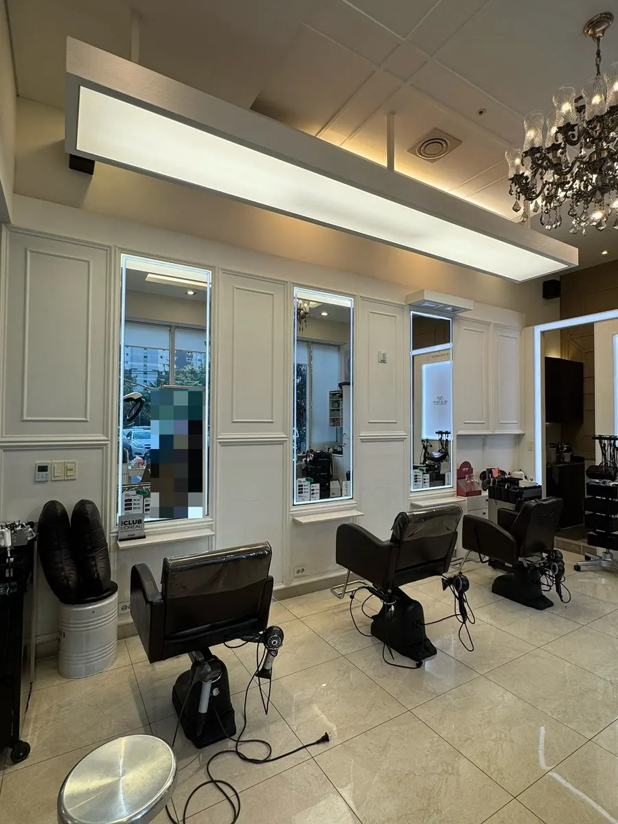 Neatly arranged treatment seating at the salon