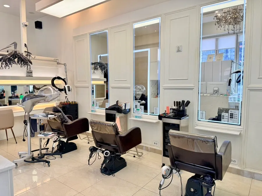 Seating in the salon's sleek interior