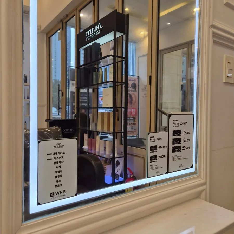 Hair products and event signage on display in the salon