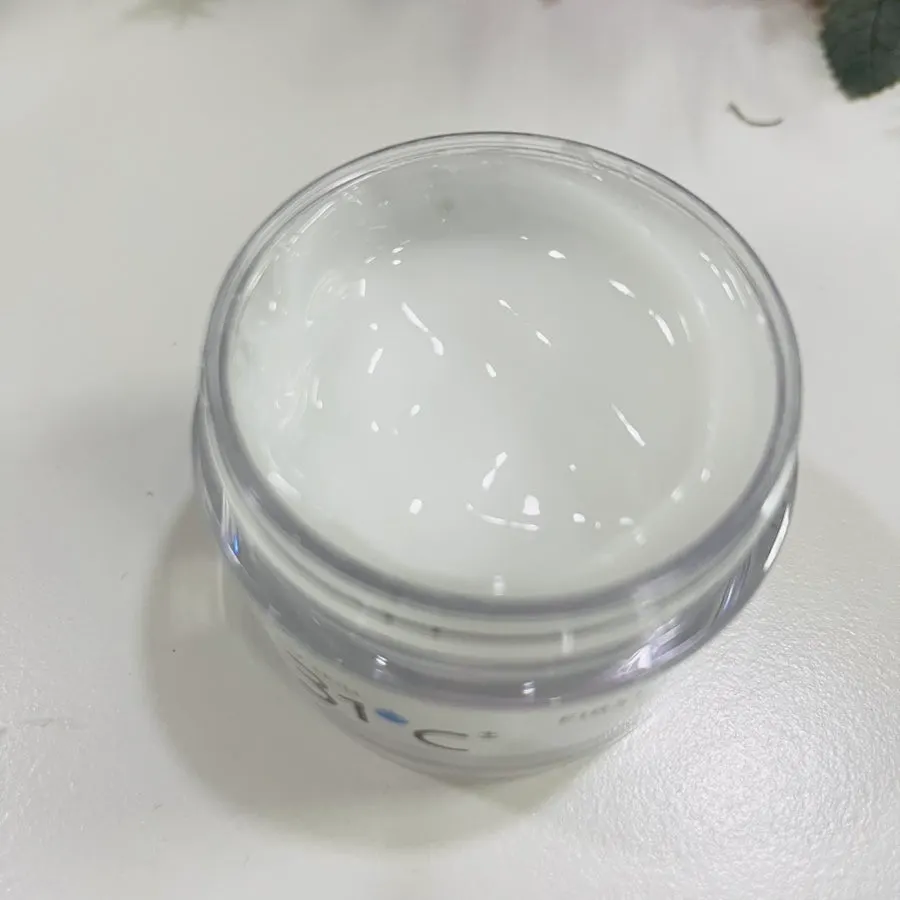 Transparent gel-cream texture dispensed onto a hand