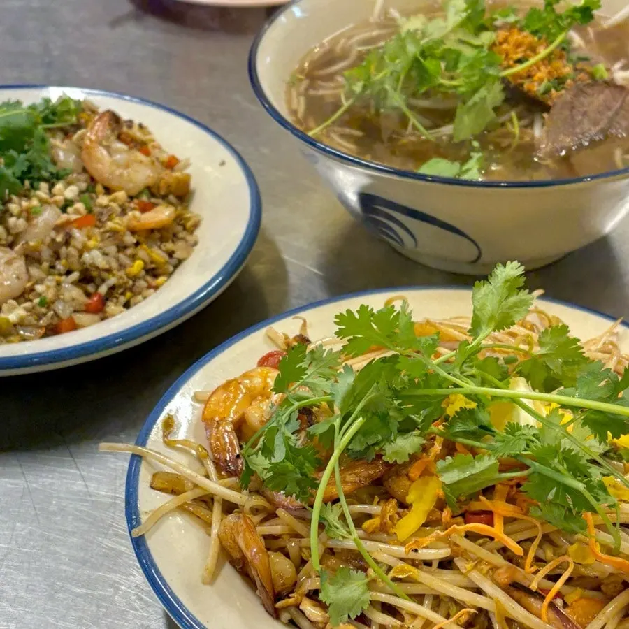 Full table of ordered pho, pad thai, and khao pad