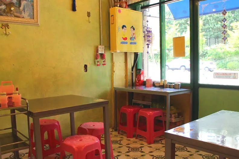 Seating area with pink plastic chairs