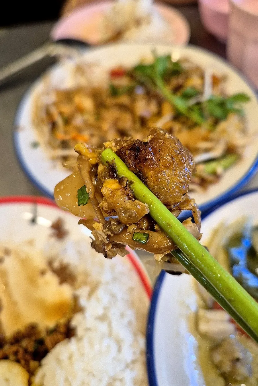 A plate of sweet-savory pad see ew