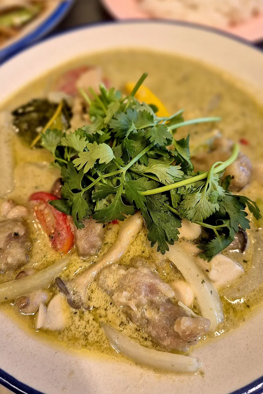 A bowl of green curry at Drunken Thai Sangam Branch