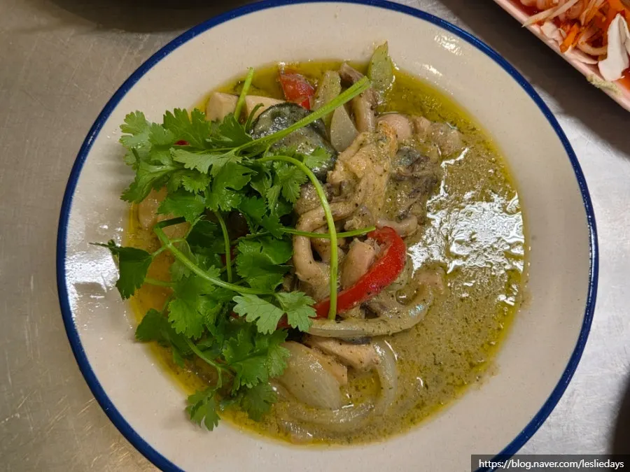 Close-up of coconut milk green curry