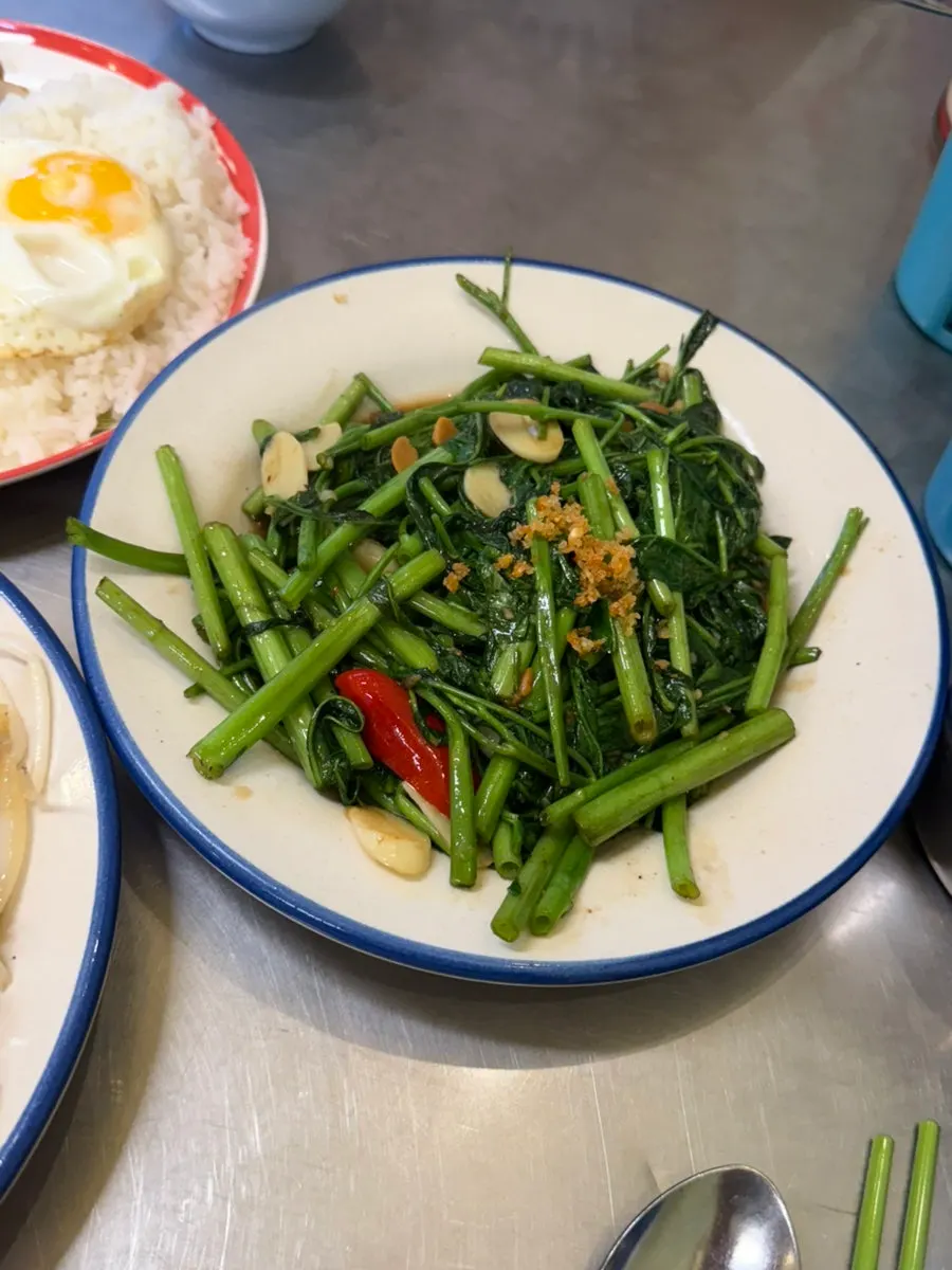 Stir-fried morning glory on a plate