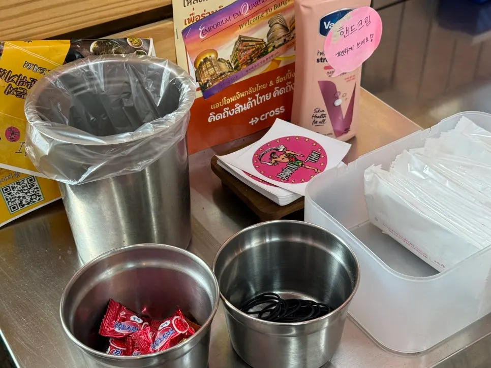 Hair ties and hand lotion set out on the table
