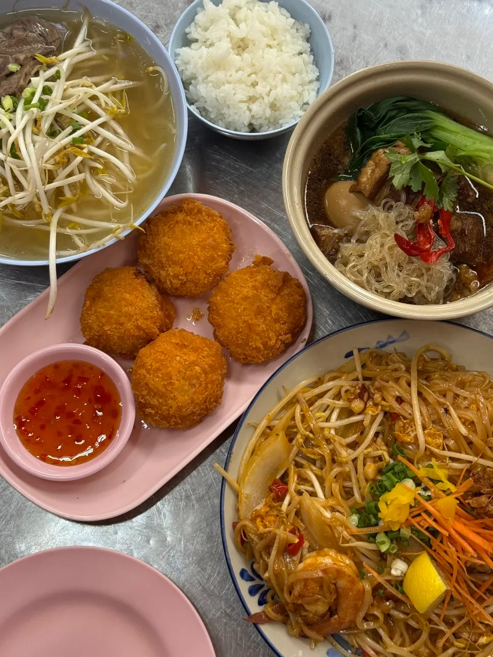 Table set with the ordered Thai dishes