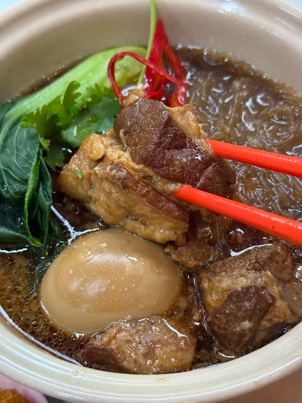 Deeply seasoned kai moo palo meat