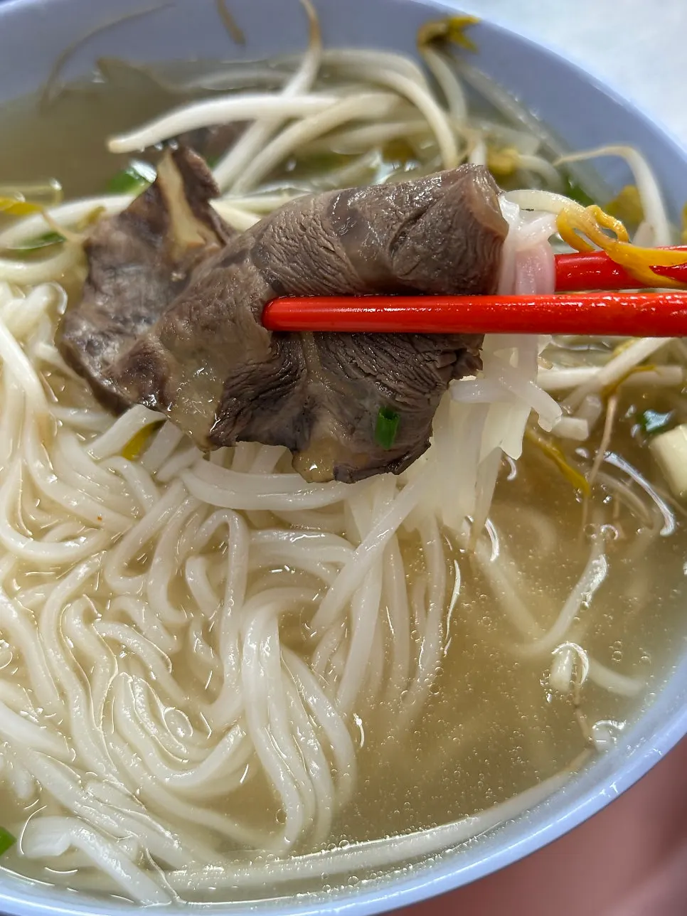 Close-up of the warm pho broth