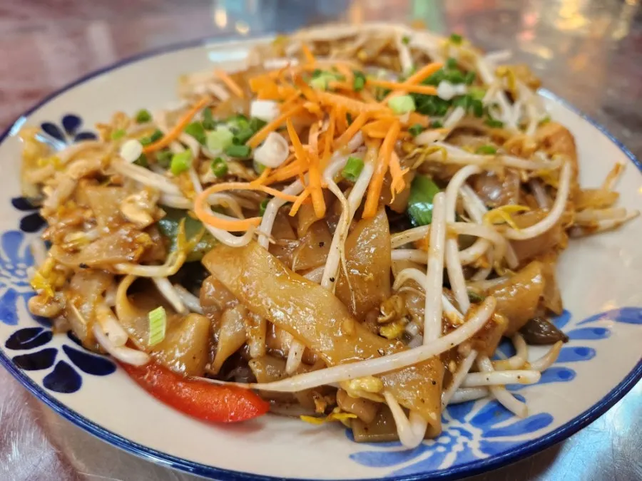 A plate of seafood-loaded pad thai