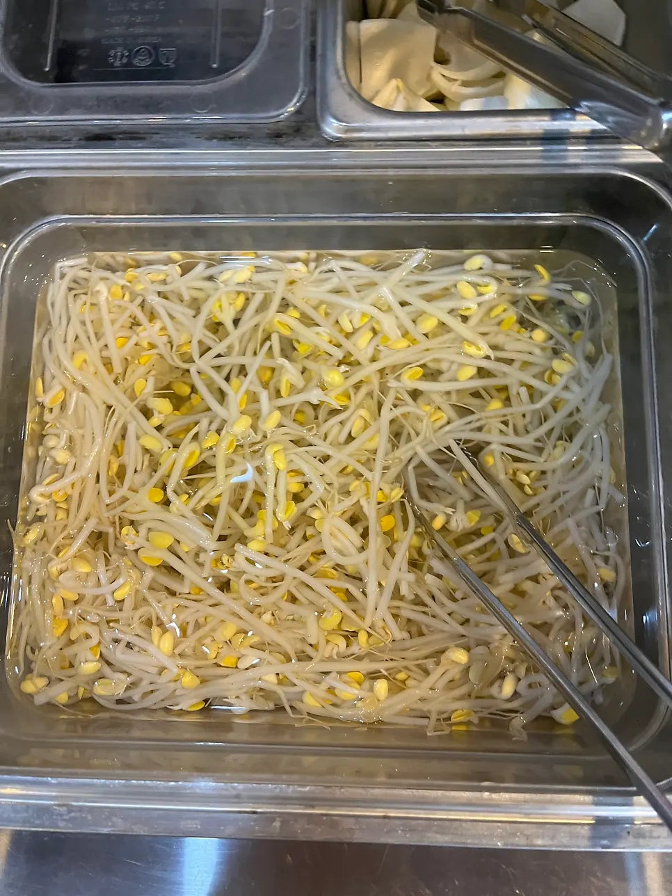 Wrap greens and side dishes prepared at the self-service bar
