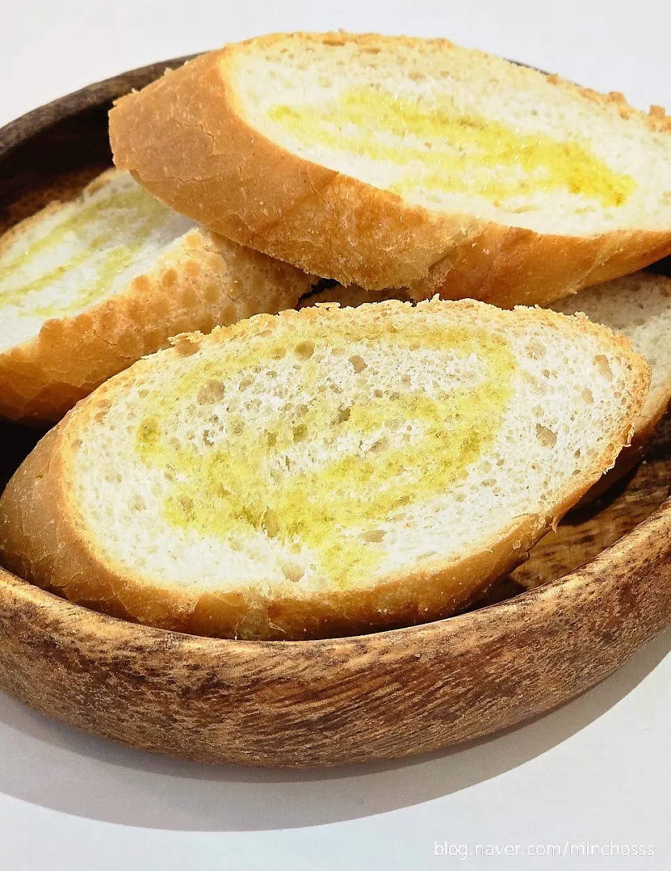 Baguette served alongside the goulash