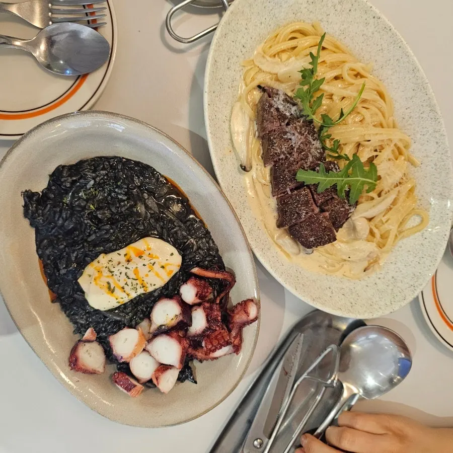 Squid ink risotto with octopus