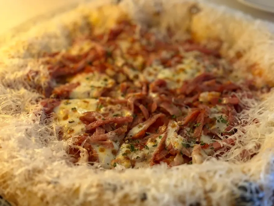 Full view of the diavola pizza topped with salami