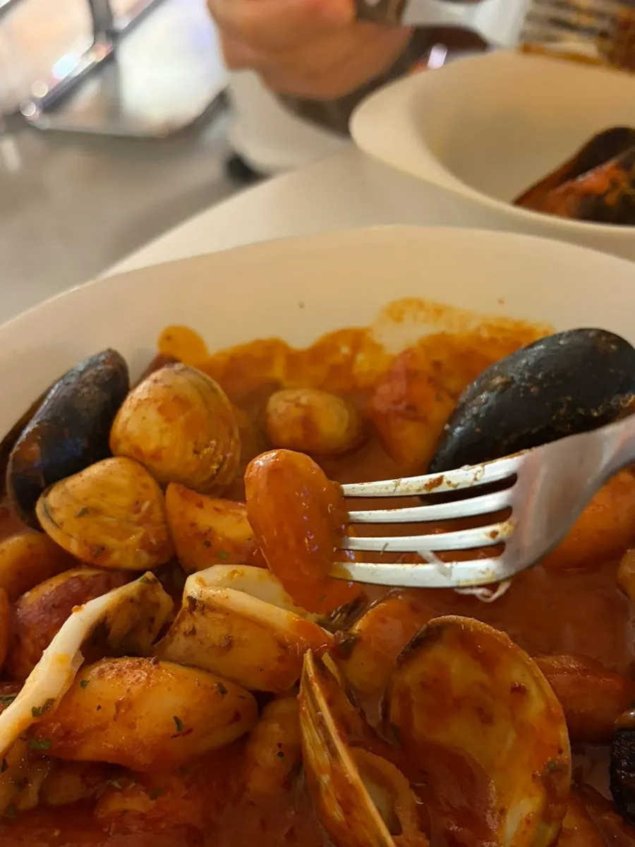 Picking up a piece of gnocchi