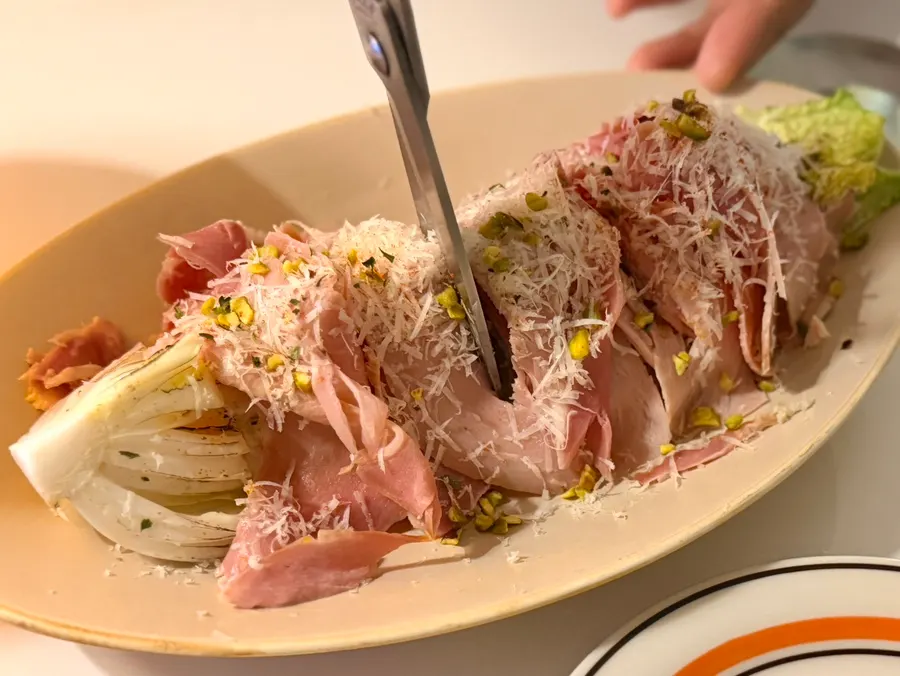 Close-up of jambon cabbage salad with dressing
