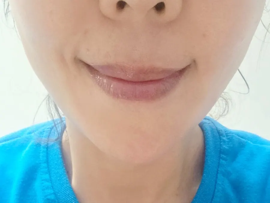 Clear pink gel texture of the lip mask