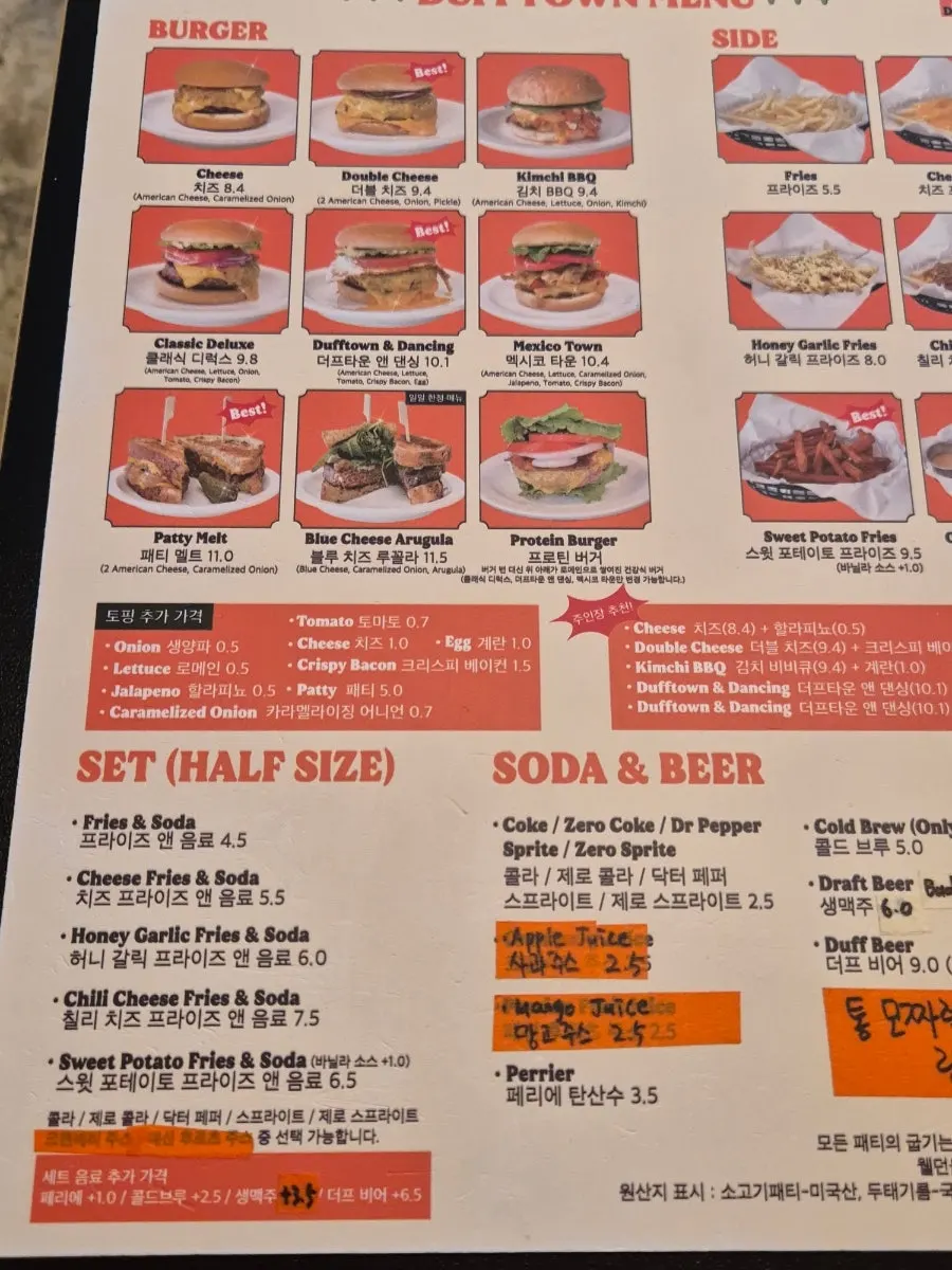Table with burger and sweet potato fries together