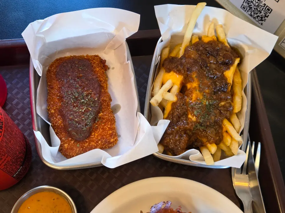 The cheese skirt burger with a bite taken out