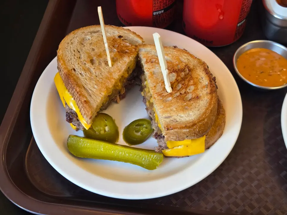 Chili cheese fries served alongside the burger