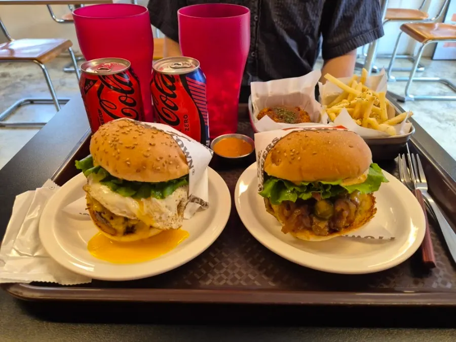 Dufftown & Dancing and Mexico Town burgers placed side by side