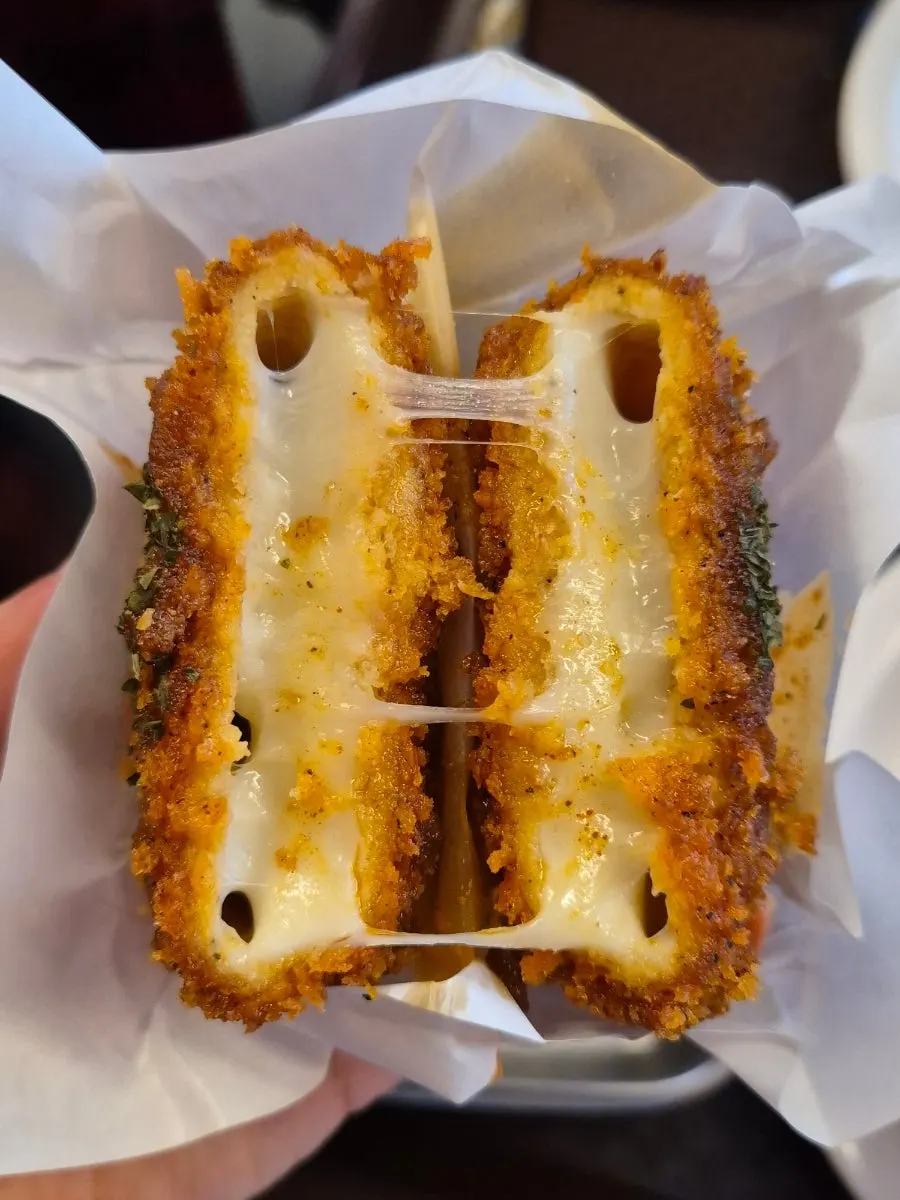 Whole mozzarella cheese sticks and half-size fries
