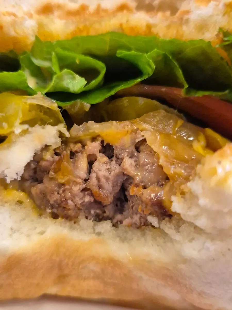 Cross-section of a burger showing a thick patty