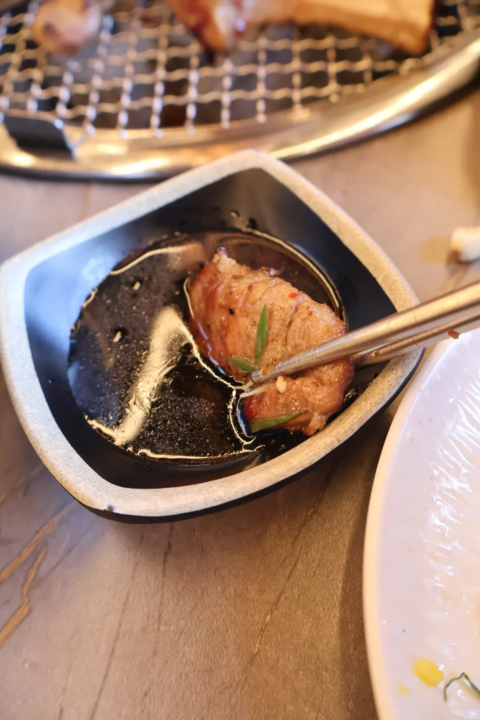 Pork galbi wrapped with perilla salad and pickled radish sheet