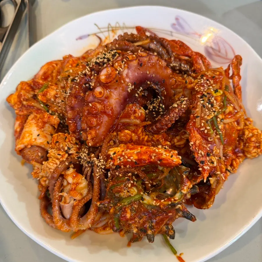 A pot of seafood stew on the table