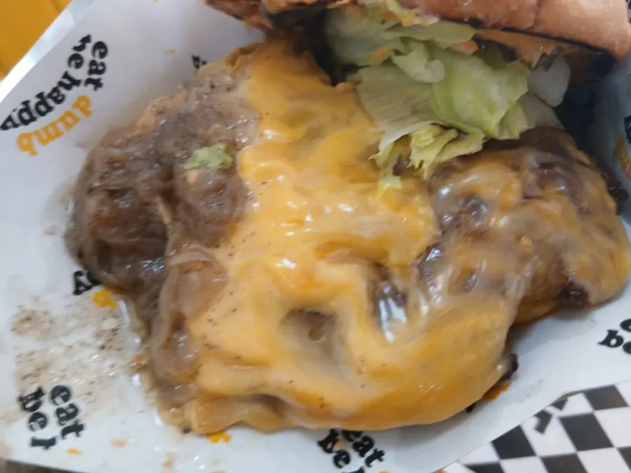 Double Deom Burger with two slices of colby jack cheese added