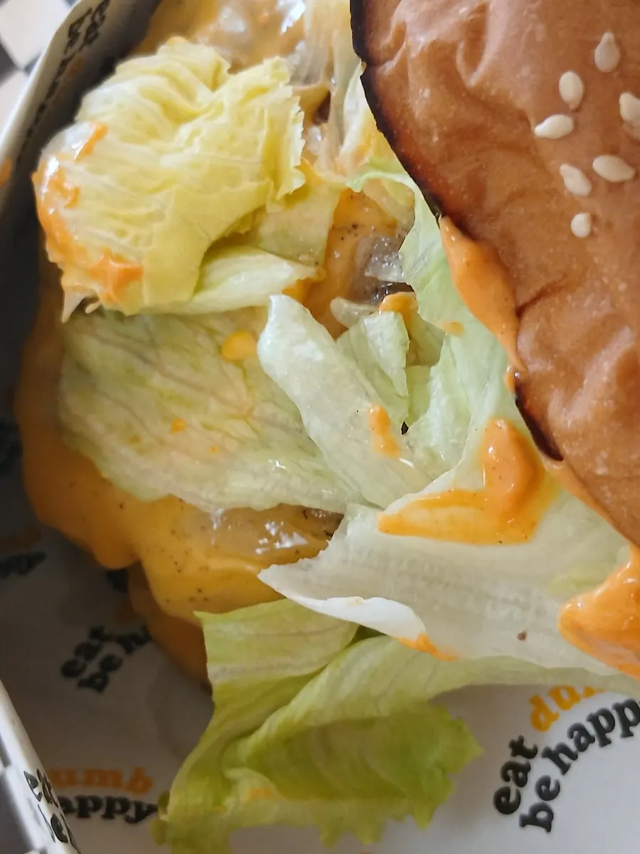 Stretchy melted colby jack cheese over the patty